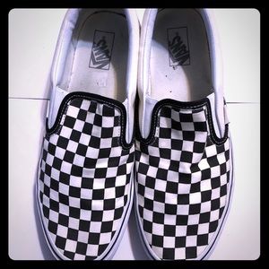 Checkered board slip on vans